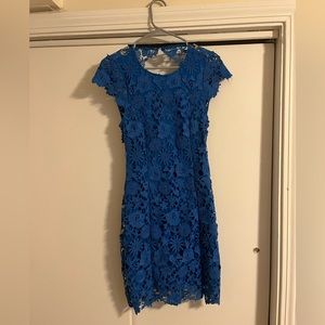 Lulus size S semi formal dress worn twice, slight tear in back.